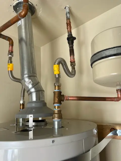 Water heater installation and plumbing repair in Mitchell